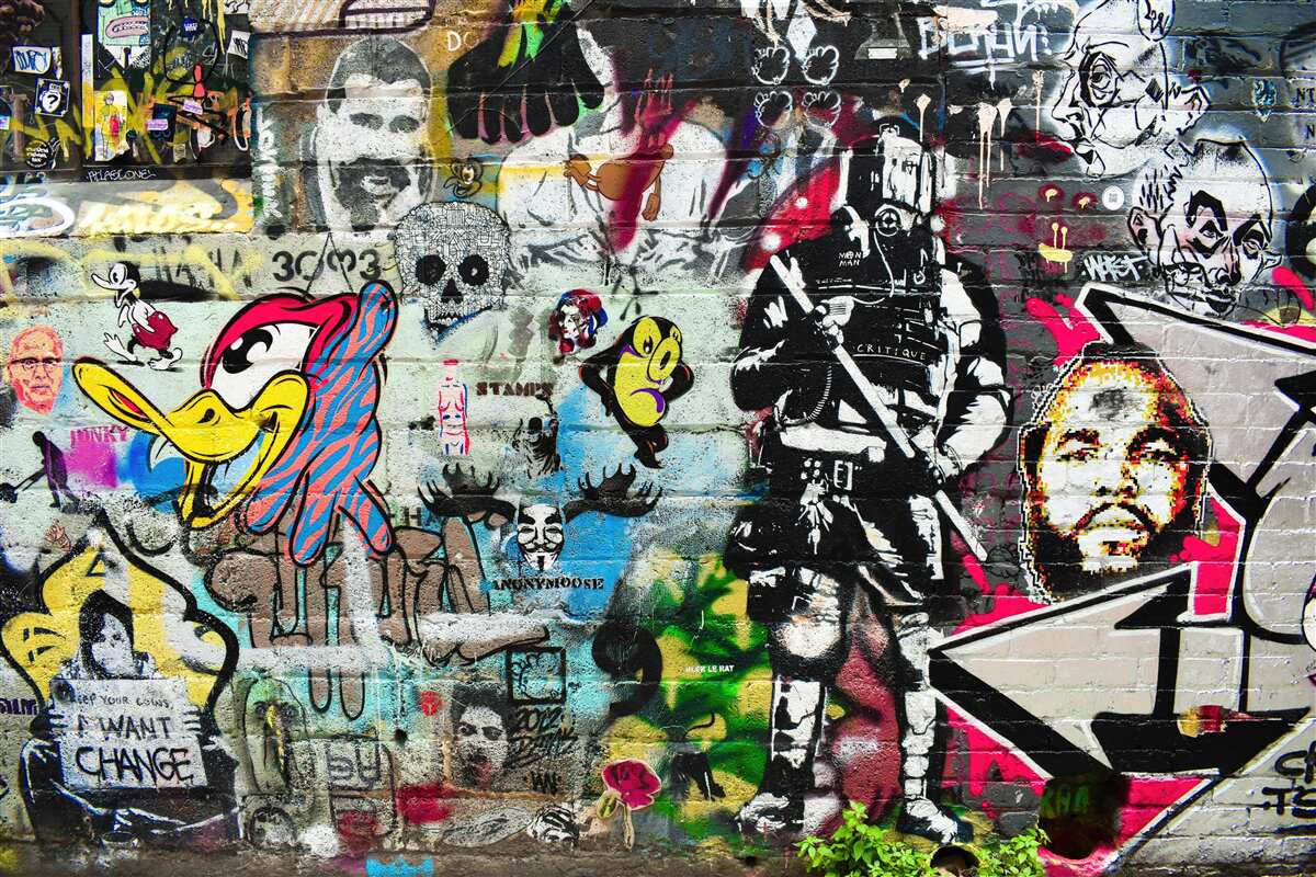 Fotobehang Muur versierd met graffiti