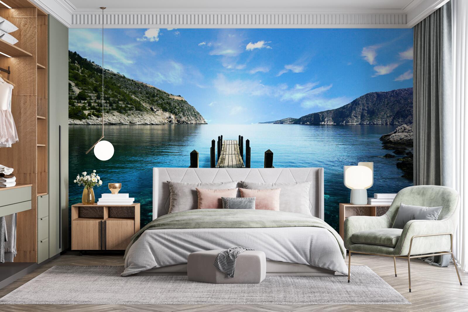 Fotobehang tegen de achtergrond van de lucht, de bergen en de rivier zie je de pontonbrug