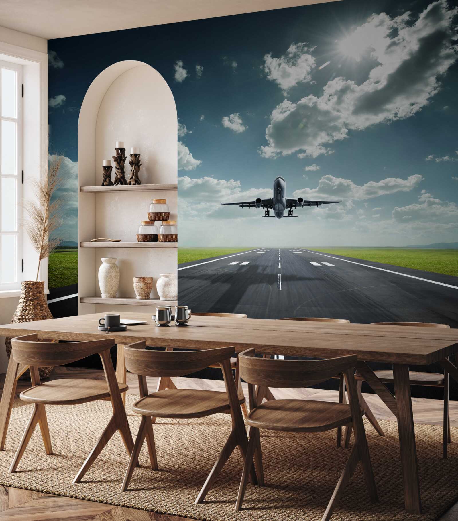 Fotobehang het vliegtuig opstijgt van de startbaan