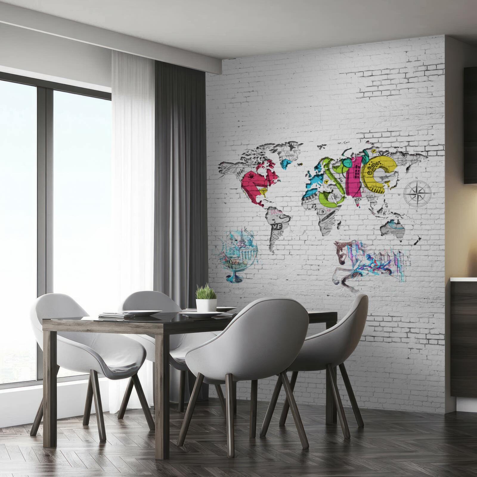 Fotobehang wereldkaart in verschillende kleuren op een witte muur