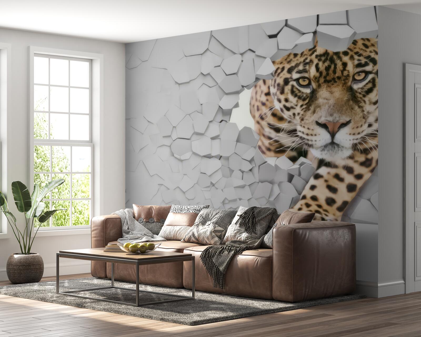Fotobehang een luipaard komt tevoorschijn uit een witte muur