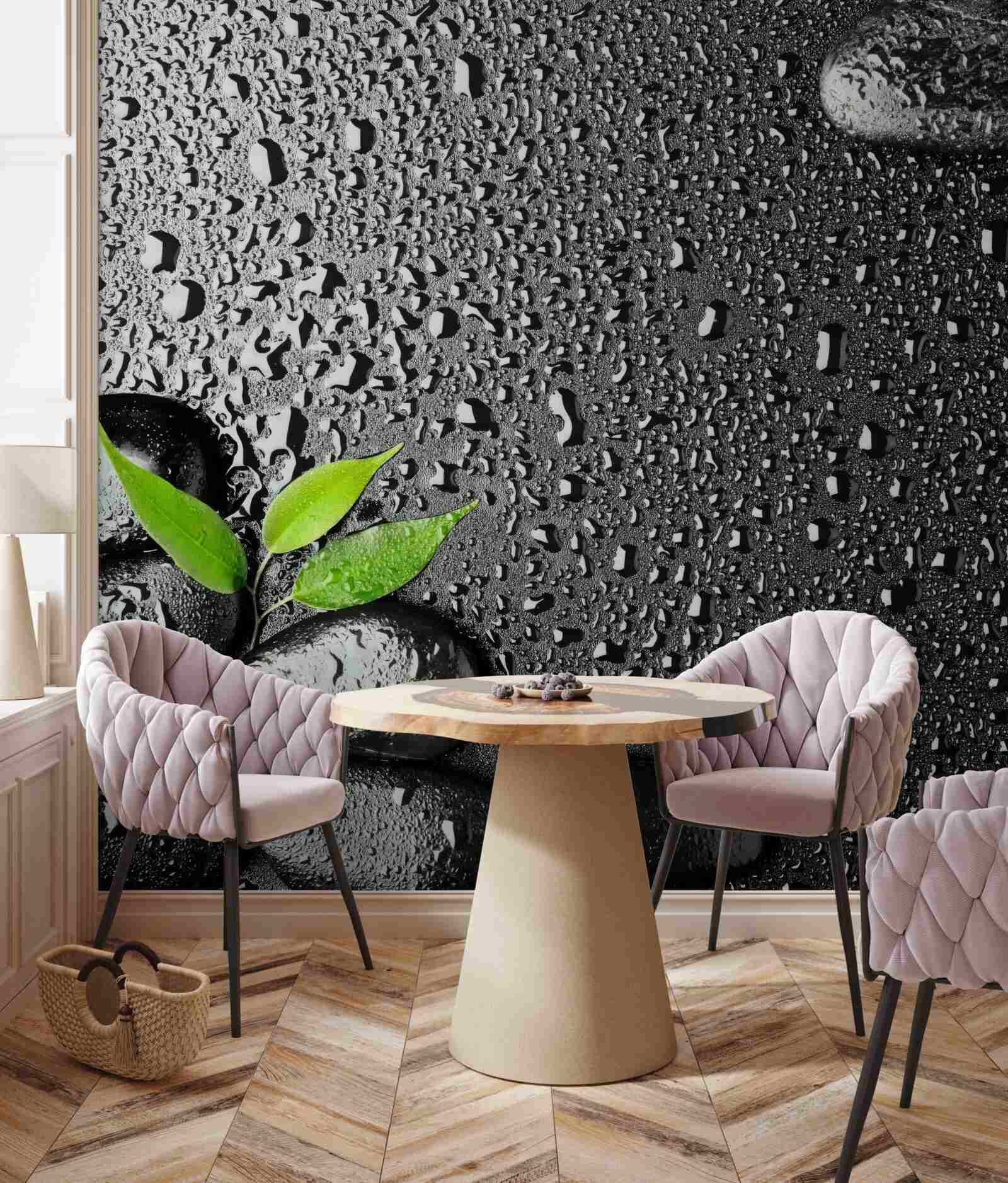 Fotobehang groene bladeren en zwarte stenen