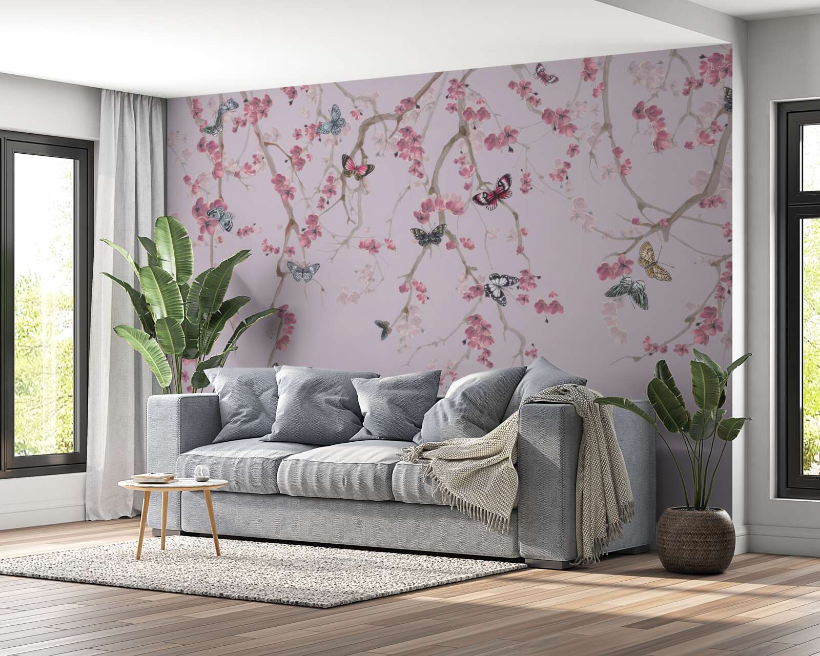 Fotobehang takken met roze bloemen en vlinders