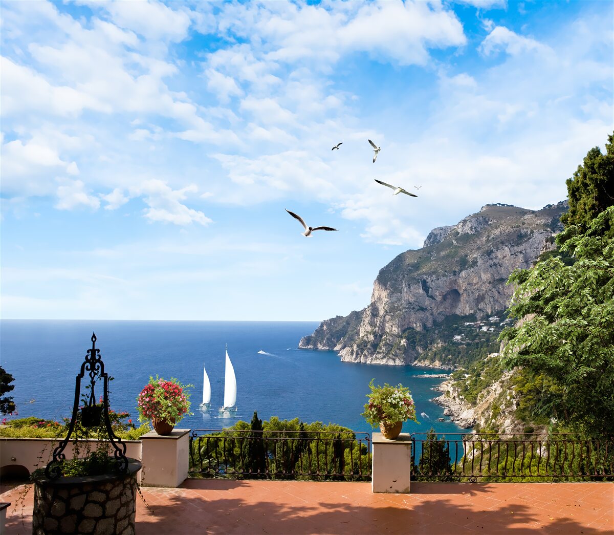 Fotobehang oceaan en bergen in het landschap