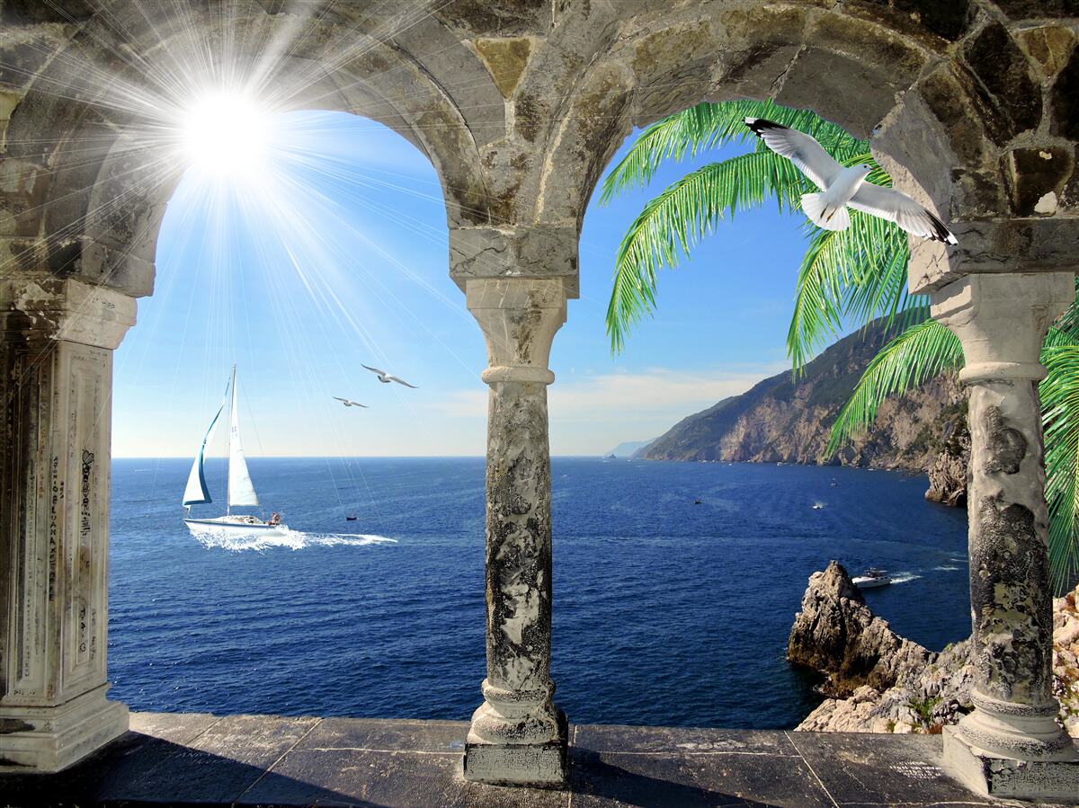 Fotobehang oude boog met uitzicht op zee