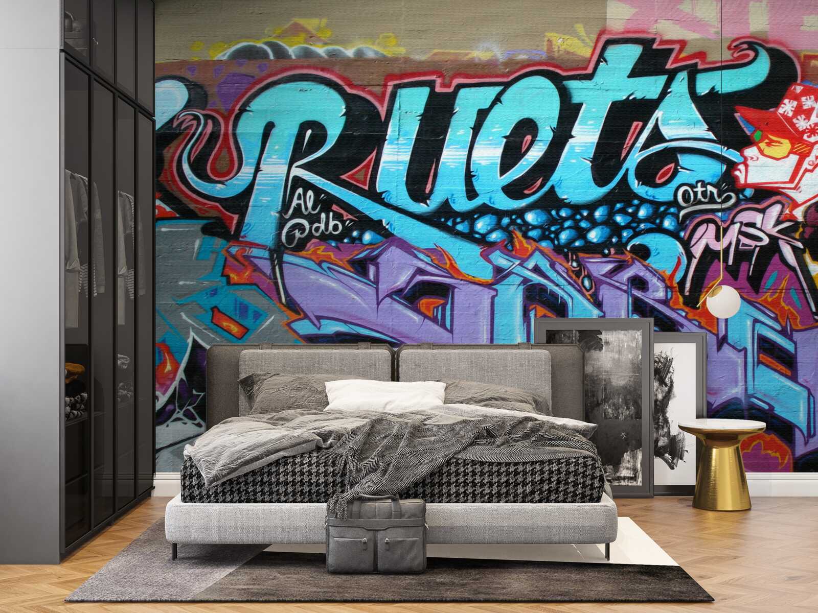 Fotobehang Muur versierd met felle graffiti