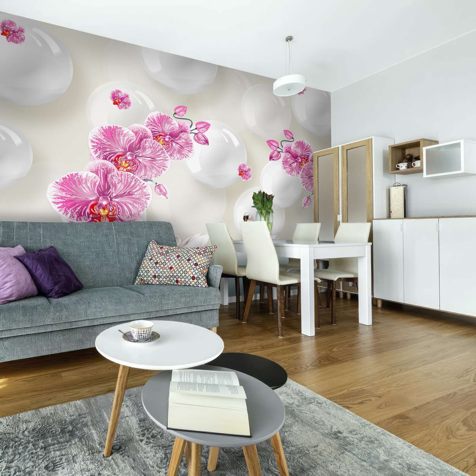 Fotobehang lila magnolia en zwanen zwemmend op het meer