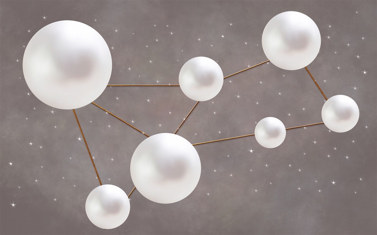 Fotobehang witte ballen versierd met gouden lijnen liggen verspreid op een grijze achtergrond